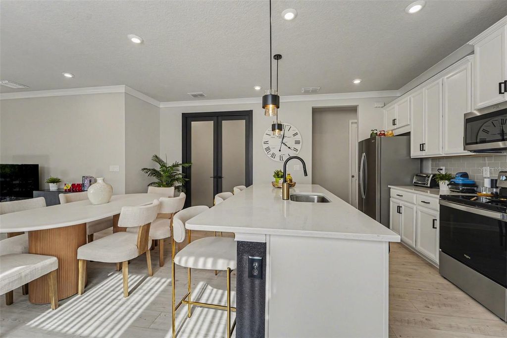 Photo of 5975 Timberdale Avenue, Wesley Chapel, FL 33545 (MLS # TB8500478)