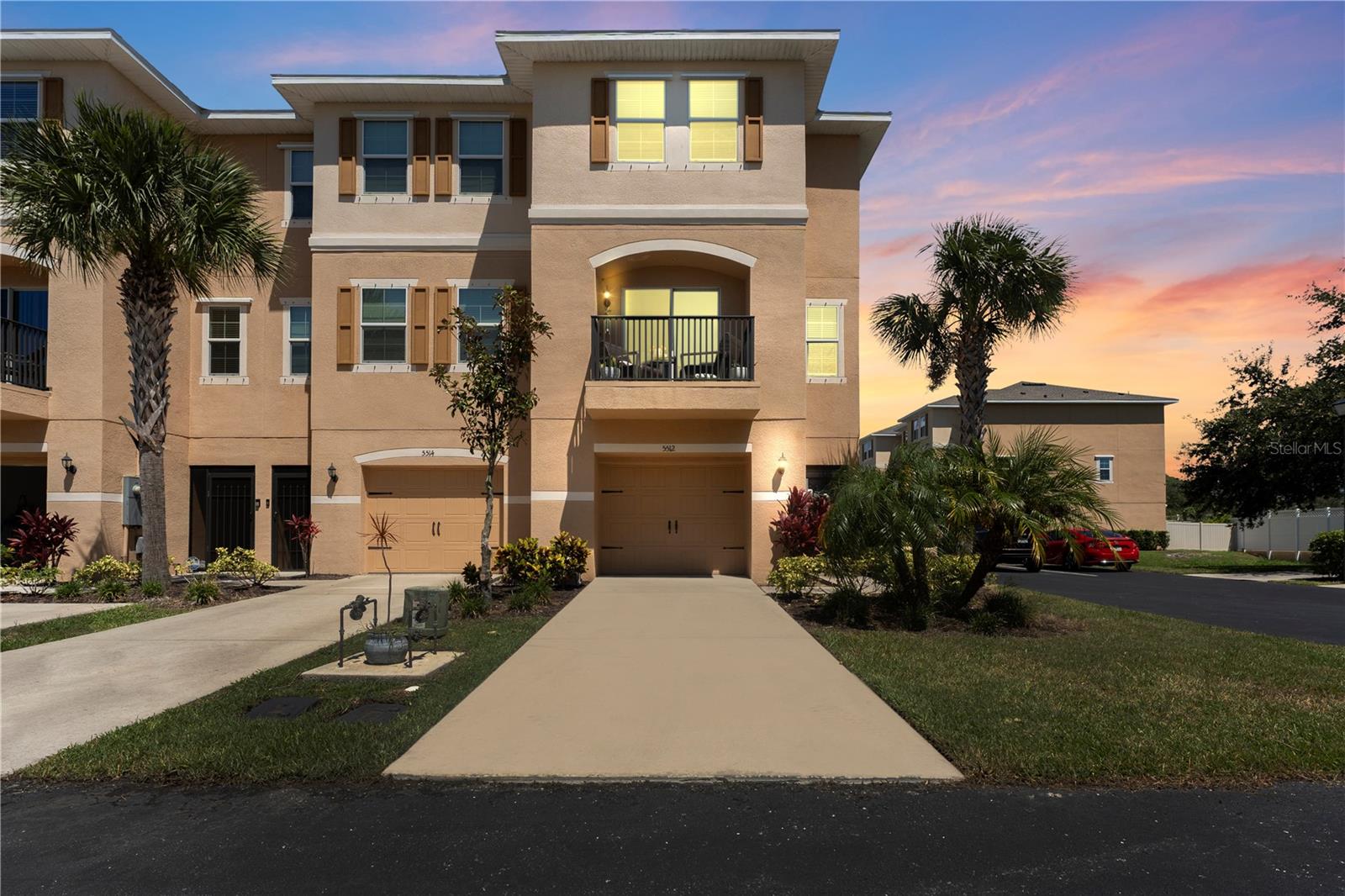 With a 1% lender credit available with the preferred lender, this tastefully designed resort-style townhome in the gated community of Sea Forest Beach Club offers 3 spacious bedrooms, 2.5 baths, and an attached garage. The third floor features two generous suites with ensuite baths and walk-in closets, along with a convenient laundry room. The second floor boasts a great room with a large kitchen equipped with stainless steel appliances, quartz breakfast bar, and ample counter space, plus a living room that opens to a private balcony and a dinette area. A third bedroom with a walk-in closet and a powder room sits just off the kitchen. The ground floor includes a private entryway, garage, two storage units, and a fenced green space perfect for entertaining, gardening, or pets. Enjoy included upgrades such as wood cabinets, an enclosed lanai, and a balcony. The low $265 monthly HOA provides two resort-style pools, a fitness center, dog park, gated entry, and access to Gulf Harbors’ private beach club for stunning sunsets and activities. This golf-cart-friendly community is close to downtown New Port Richey’s restaurants, Sims Park, and local events, with boat slips available nearby for sale or lease.