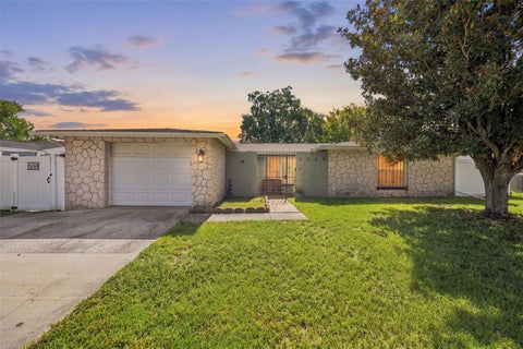 Photo of 9040 Crabtree Lane, Port Richey, FL 34668 (MLS # TB8538612)