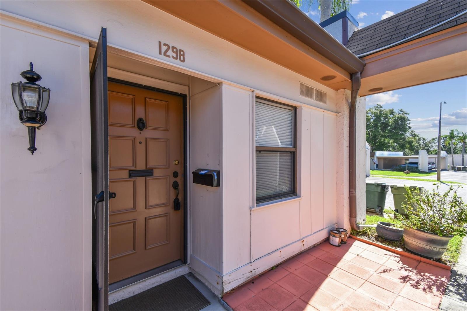Relax and enjoy yourself in this tranquil 55+ setting. Mission Hills is an active community in a location convenient to great restaurants and shopping. This one bedroom, one bath condo is an end unit that features a Florida Room that opens to expansive back green space. Home has been freshly painted and features new luxury vinyl throughout. Walk to the pool and the clubhouse located close by in a park like setting. Rent includes gas for the range and heat along with water, sewer, garbage and basic cable. Assigned covered parking and storage closet steps from your front door. Moccasin Lake, a 51 acre nature preserve, is just over a mile away with trails and boardwalks under a canopy of mature oaks and across ponds and creeks. Move in costs include first month's rent, security deposit and application fee. Association approval and annual lease is required. NO pets. NO smoking. Room measurements are approximate and should be verified. Tenants are required to provide proof of renter’s insurance.