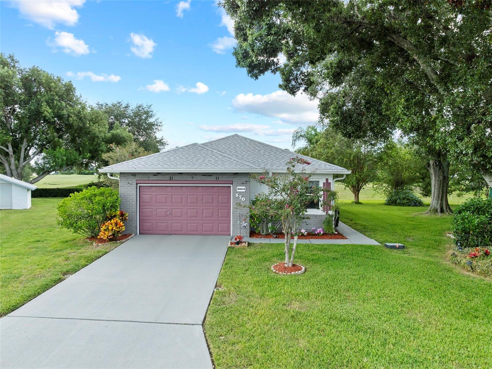 Charming 2 bedroom, 2 bath home with garage located on the 11th hole of the golf course in the desirable and conveniently located Sandpiper Golf & Country Club! This spacious floor plan features a nicely sized eat-in kitchen plus room for more formal dining in the large living/dining combo with high ceilings. A light-filled Florida room at the rear of the home provides additional living space and views of the larger-than-average backyard. Important updates include: roof replaced 2022, replumbed in 2007, windows replaced in 2010, hot water heater approx. 3–5 years old, A/C ductwork replaced 3 years ago, and A/C system installed in 2014. The roof has the third nail update for potential homeowners insurance savings, and a termite bait system with contract in place adds peace of mind. Super location - walk to Publix and restaurants with access to I-4 in apporx. 1/4 mile! Low monthly HOA fee includes lawn maintenance as well as Spectrum cable TV and internet. A wonderful opportunity to enjoy golf course living in an active, well-maintained 55+ community that offers a great clubhouse, pool, tennis, pickleball, shuffleboard, fitness, The Links restaurant and bar and a golf pro-shop!