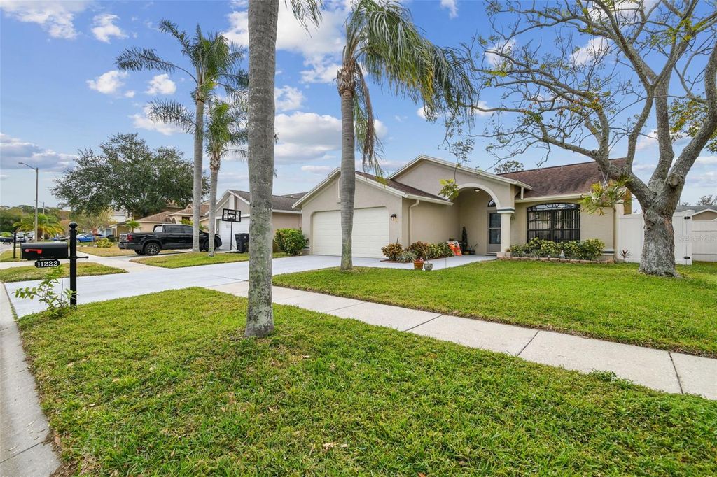 Photo of 11222 Moonvalley Way, Tampa, FL 33635 (MLS # TB8332536)