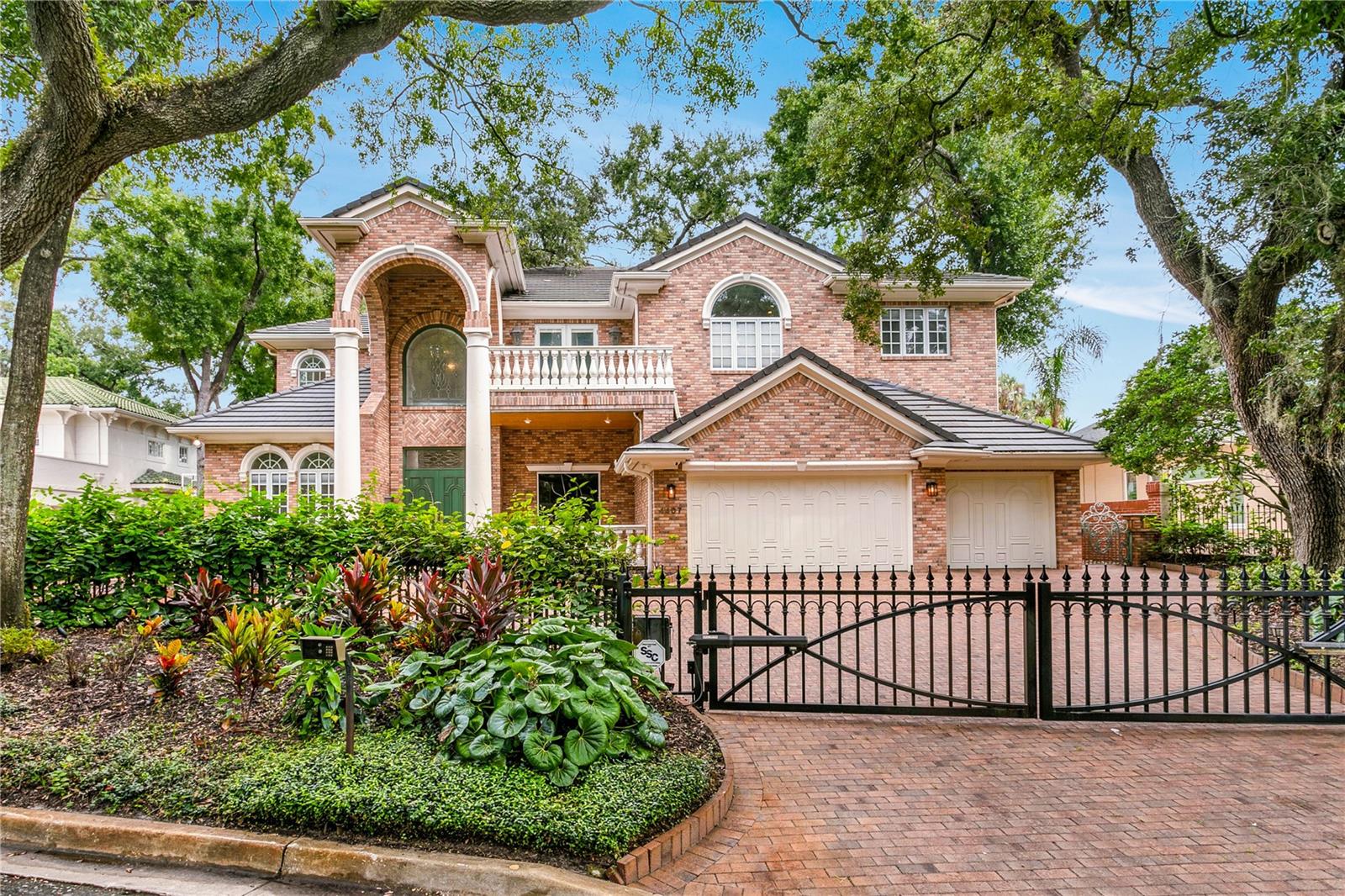 Welcome to 4407 W Dale Avenue, a Mediterranean-inspired estate in the highly desirable Beach Park neighborhood of South Tampa. This custom-built residence blends timeless architecture with modern conveniences, offering more than 7,200 square feet of living space on a beautifully landscaped .40-acre lot. Set among tree-lined streets and mature oaks, this impressive two-story brick home combines privacy, elegance, and comfort in one of Tampa's most sought-after communities. The grand entry sets the stage with a 22-foot foyer framed by stone columns and wrought-iron accents, creating a dramatic first impression. Inside, expansive living and dining areas flow seamlessly, highlighted by soaring ceilings with natural light pouring through oversized windows. Intricate crown molding, solid-core 10-foot doors, and travertine details showcase the home's craftmanship, while an elevator provides convenience across levels. Every space is thoughtfully designed, offering formal and casual areas that are ideal for family living and entertaining. At the heart of the home, the gourmet kitchen is equipped for both chefs and everyday cooks. Featuring dual Sub-Zero refrigerators, granite countertops, a center island, professional-grade gas range, and stainless-steel appliances, this kitchen is as functional as it is beautiful. A breakfast area overlooking the backyard creates the perfect setting for morning coffee or casual meals, while adjoining living spaces make hosting effortless. The expansive primary suite is a private retreat, complete with a sitting area. dual walk-in closets, and a unique dressing space with sink and refrigerator. The spa-like bath offers dual vanities, a soaking tub and walk-in shower, creating a resort-style experience. Generously sized secondary bedrooms each feature en-suite baths, providing comfort and privacy for family and guests. Outdoor living is equally impressive. A sparkling pool, spa, and multiple patio areas provide both tranquility and space for entertaining. A cabana/guest house provides additional flexibility-perfect for visitors, extended family, or a private home office. Whether you're hosting gatherings or simply unwinding by the pool, the backyard feels like a private oasis. Additional features include multiple living areas, a three-car garage. ample storage, and thoughtfully designed spaces that can be customized to suit your lifestyle.