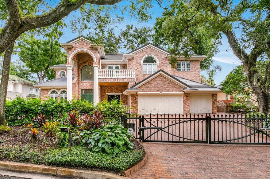 Welcome to 4407 W Dale Avenue, a Mediterranean-inspired estate in the highly desirable Beach Park neighborhood of South Tampa. This custom-built residence blends timeless architecture with modern conveniences, offering more than 7,200 square feet of living space on a beautifully landscaped .40-acre lot. Set among tree-lined streets and mature oaks, this impressive two-story brick home combines privacy, elegance, and comfort in one of Tampa's most sought-after communities. The grand entry sets the stage with a 22-foot foyer framed by stone columns and wrought-iron accents, creating a dramatic first impression. Inside, expansive living and dining areas flow seamlessly, highlighted by soaring ceilings with natural light pouring through oversized windows. Intricate crown molding, solid-core 10-foot doors, and travertine details showcase the home's craftmanship, while an elevator provides convenience across levels. Every space is thoughtfully designed, offering formal and casual areas that are ideal for family living and entertaining. At the heart of the home, the gourmet kitchen is equipped for both chefs and everyday cooks. Featuring dual Sub-Zero refrigerators, granite countertops, a center island, professional-grade gas range, and stainless-steel appliances, this kitchen is as functional as it is beautiful. A breakfast area overlooking the backyard creates the perfect setting for morning coffee or casual meals, while adjoining living spaces make hosting effortless. The expansive primary suite is a private retreat, complete with a sitting area. dual walk-in closets, and a unique dressing space with sink and refrigerator. The spa-like bath offers dual vanities, a soaking tub and walk-in shower, creating a resort-style experience. Generously sized secondary bedrooms each feature en-suite baths, providing comfort and privacy for family and guests. Outdoor living is equally impressive. A sparkling pool, spa, and multiple patio areas provide both tranquility and space for entertaining. A cabana/guest house provides additional flexibility-perfect for visitors, extended family, or a private home office. Whether you're hosting gatherings or simply unwinding by the pool, the backyard feels like a private oasis. Additional features include multiple living areas, a three-car garage. ample storage, and thoughtfully designed spaces that can be customized to suit your lifestyle.