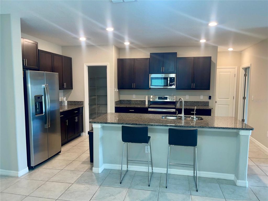 Photo of 9520 Lemon Drop Loop, Sun City Center, FL 33573 (MLS # TB8390522)