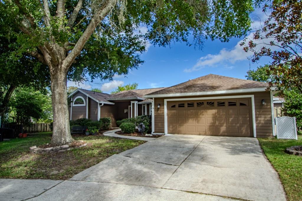 Welcome to your private oasis in the heart of Eagle Point! Tucked away on a quiet cul-de-sac, this well-maintained 4-bedroom, 2-bath pool home offers nearly 2,000 sq ft of comfortable living space. Enjoy the airy, open-concept layout featuring a spacious kitchen perfect for entertaining, a cozy fireplace, and beautiful wood laminate flooring throughout the main living areas. Step outside to a large screened porch overlooking a sparkling in-ground pool, and fenced yard—ideal for relaxing or hosting guests. Located in a sidewalk-lined community with low HOA fees, this home combines comfort, charm, and convenience in one exceptional package. Don’t miss out—schedule your private showing today!