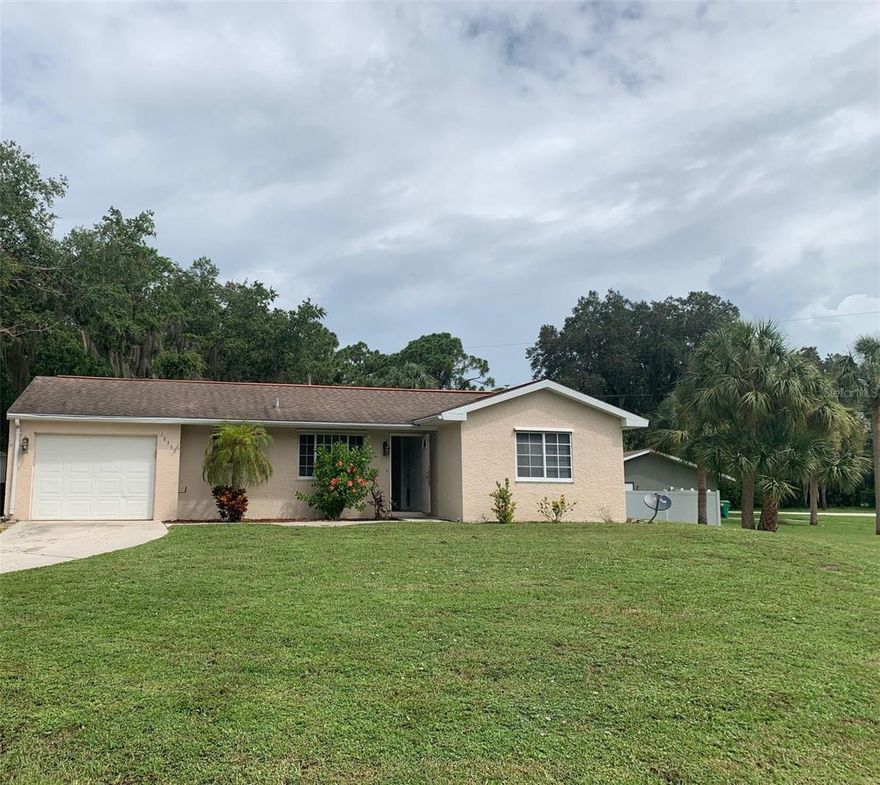 Right in the heart of Port Charlotte, here is the perfect place to call home. With immediate availability, start packing your bags today. Situated on an oversized corner lot, with a fenced back yard, plenty of room for the kiddos to play catch with the Pup. Tile and laminate flooring keep the house cool, clean and provide a modern aesthetic. The kitchen has been updated which will please the cook in the family. The lanai is fully enclosed and provides extra living space. Park the car in the attached garage and avoid bringing the groceries inside in the rain. Please call for showing details.