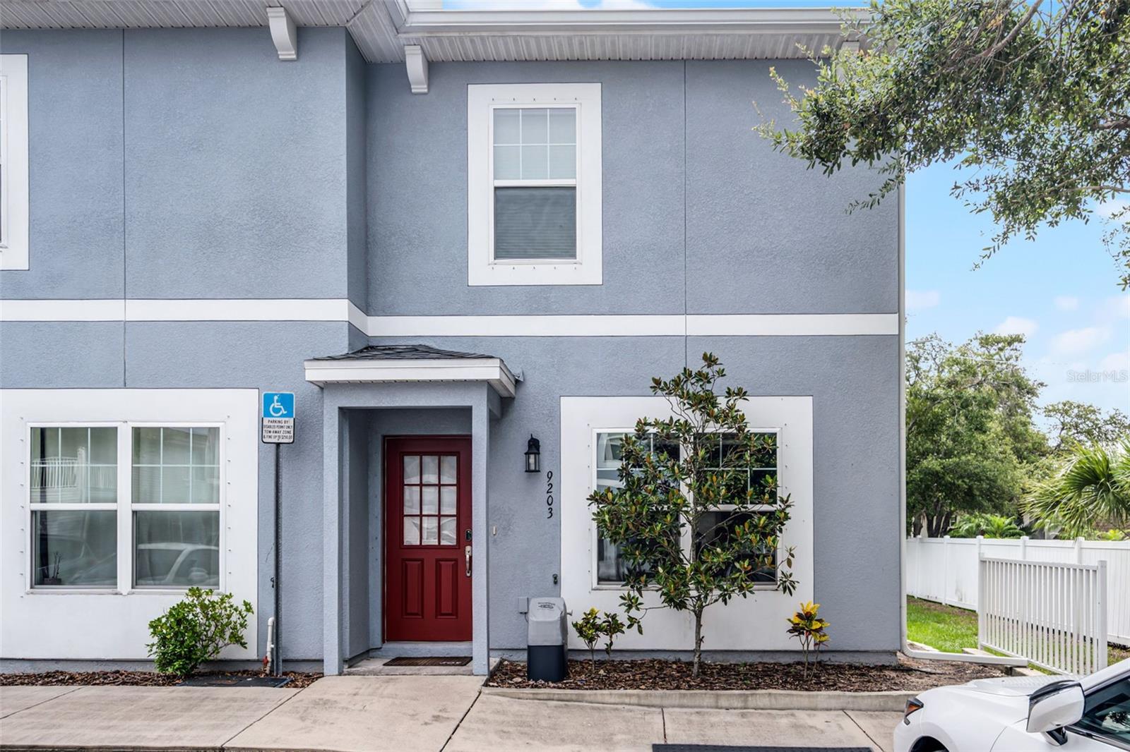 Price improvement. Charming and meticulously maintained townhome featuring an open-concept layout and a spacious kitchen. Enjoy a combined living and dining area with sleek stainless steel appliances. Upstairs offers convenient laundry with washer and dryer included, along with two bedrooms—each with its own en-suite bathroom. Relax on your private patio. Ideally located near the University of South Florida, Tampa International Airport, downtown Tampa, and Busch Gardens. Easy access to MacDill Air Force Base for a smooth commute. For added piece of mind, this townhome is wired and monitored with SimplySafe security system. Whether you're a first-time homebuyer or investor, you won't want to pass up this opportunity to make this yours!