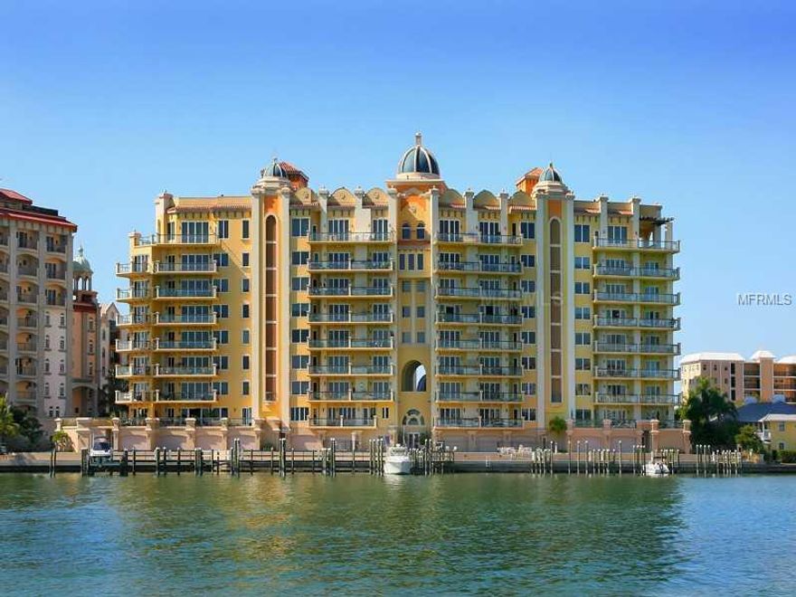 La Bellasara. One of the most distinctive addresses in downtown Sarasota and home to some of the best views of the, downtown skyline, City Park, Marina Jack's, Sarasota bay front and the boat's docked below. Chef's kitchen complete with granite counters,Sub-Zero refrigerator, commercial grade gas 6 burner stove, island with separate sink, pantry and large wine refrigerator. Enjoy your morning coffee in the breakfast area or step outside on to the adjacent terrace to take in the beautiful sunrise. Marblefloors throughout the main living areas, fireplace, hand painted tray ceilings, home theatre, wood paneled office with built in cabinetry, and summer kitchen are just some of the upgrades throughout this residence. Exceptional master suite with terrace and his and her master baths with two sided walk in shower and Jacuzzi tub. This unit includes private elevator entry, deep water boat dock, for up to 65 foot. boat, two car garage and separate storage room. Building features full concierge service, beautiful harbor side pool area, fitness room, theatre and billiard room. Price includes 65 foot. boat dock.