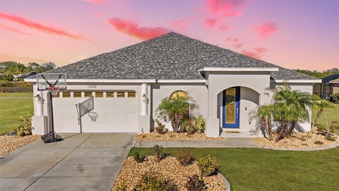 Photo of 13048 SW Pembroke Circle S, Lake Suzy, FL 34269 (MLS # C7520428)