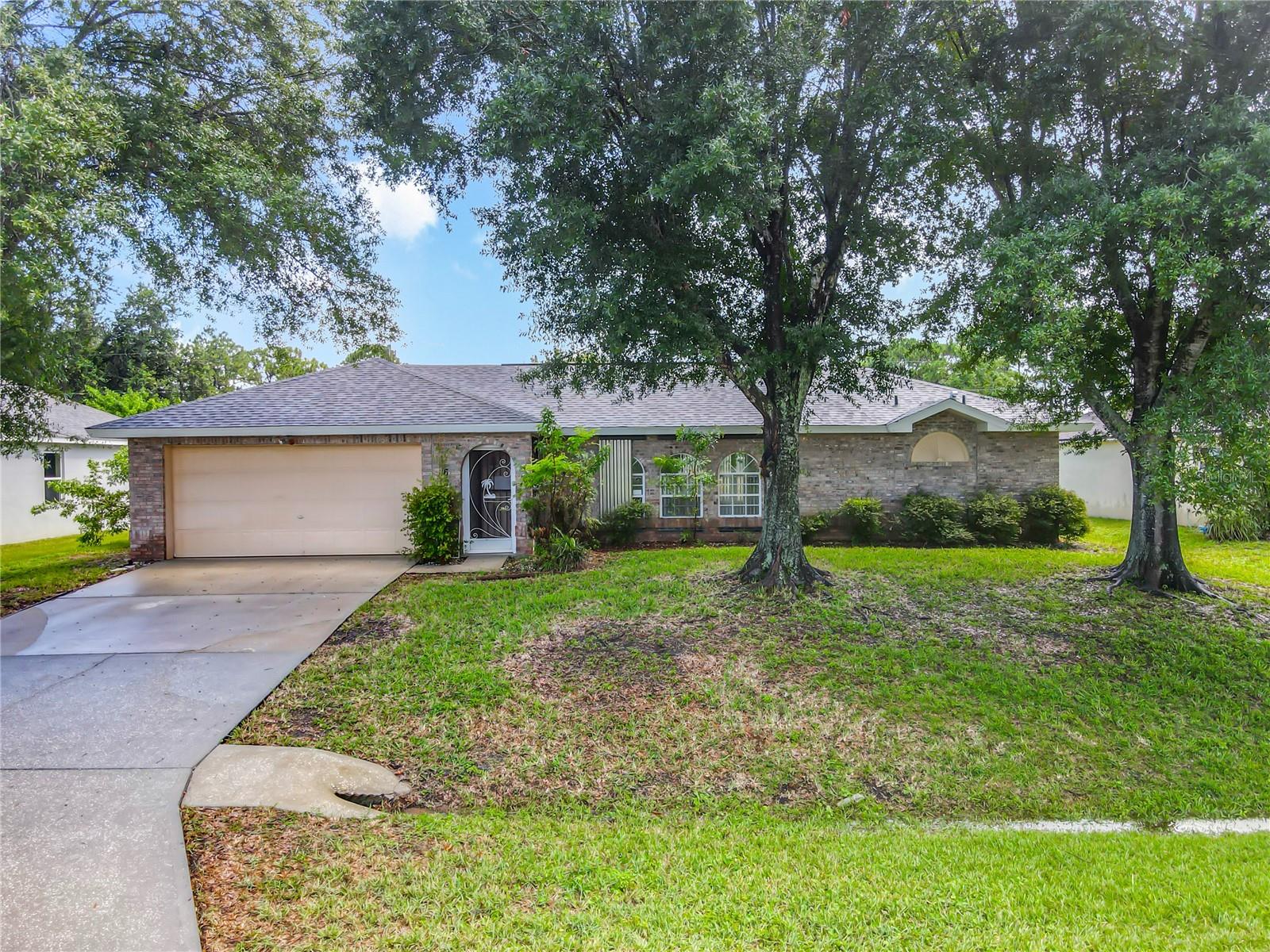 Spacious 4-Bedroom, 2-Bath Home with Screened Porch & Great Location
Discover the perfect blend of comfort and potential in this charming 4-bedroom, 2-bath home, set on a beautifully maintained lot with mature shade trees, this home offers inviting curb appeal and a warm welcome the moment you arrive.
Inside, you’ll find it to be bright and spacious with vaulted ceilings and an abundance of natural light. The kitchen is equipped with ample cabinetry, plenty of counter space, a breakfast bar, and a convenient pass-through to the dining area—ideal for casual meals and entertaining. Multiple living spaces, including a formal living room and a family room, provide flexibility for gatherings, relaxation, or a home office setup.
A cozy master bedroom and bathroom featuring a spacious walk-in closet, dual vanities. Three additional bedrooms offer comfortable accommodations for family and guests.
Step outside to the screened porch, the perfect spot for enjoying your morning coffee or hosting weekend barbecues, all while overlooking the backyard. An attached 2-car garage, indoor laundry area, and generous storage add to the home’s convenience.
Located just minutes from shopping, dining, parks, this home offers endless potential to make it your own. Whether you’re looking for your forever home or a smart investment, this property is a must-see!
Don’t miss your opportunity—schedule your showing today!