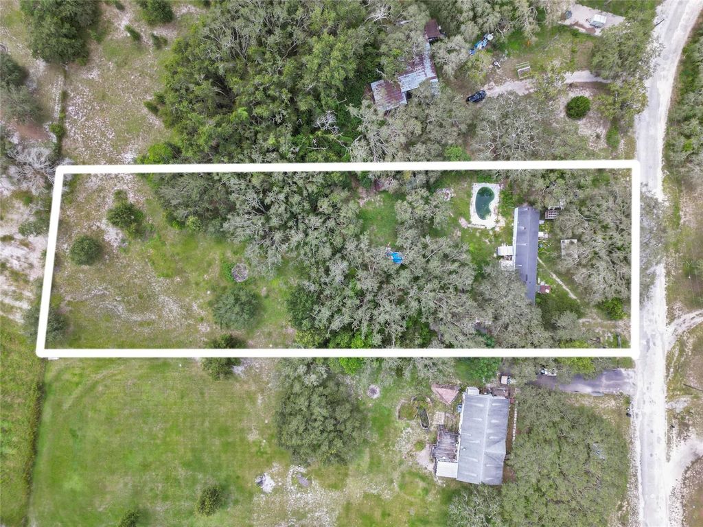 Photo of 13306 Vivian Lane, Hudson, FL 34669 (MLS # O6350575)