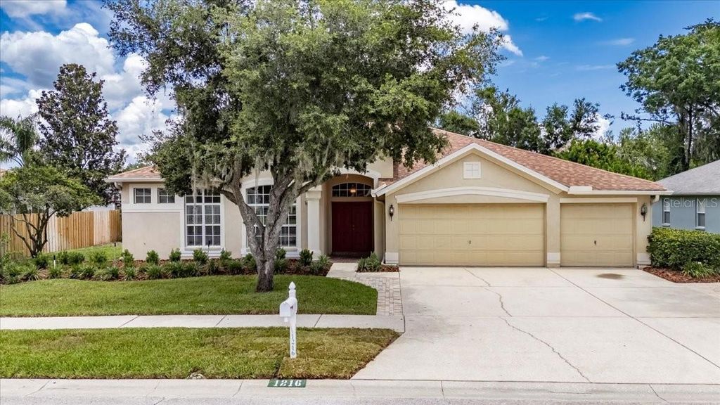 Photo of 1216 Fox Chapel Drive, Lutz, FL 33549 (MLS # TB8402044)