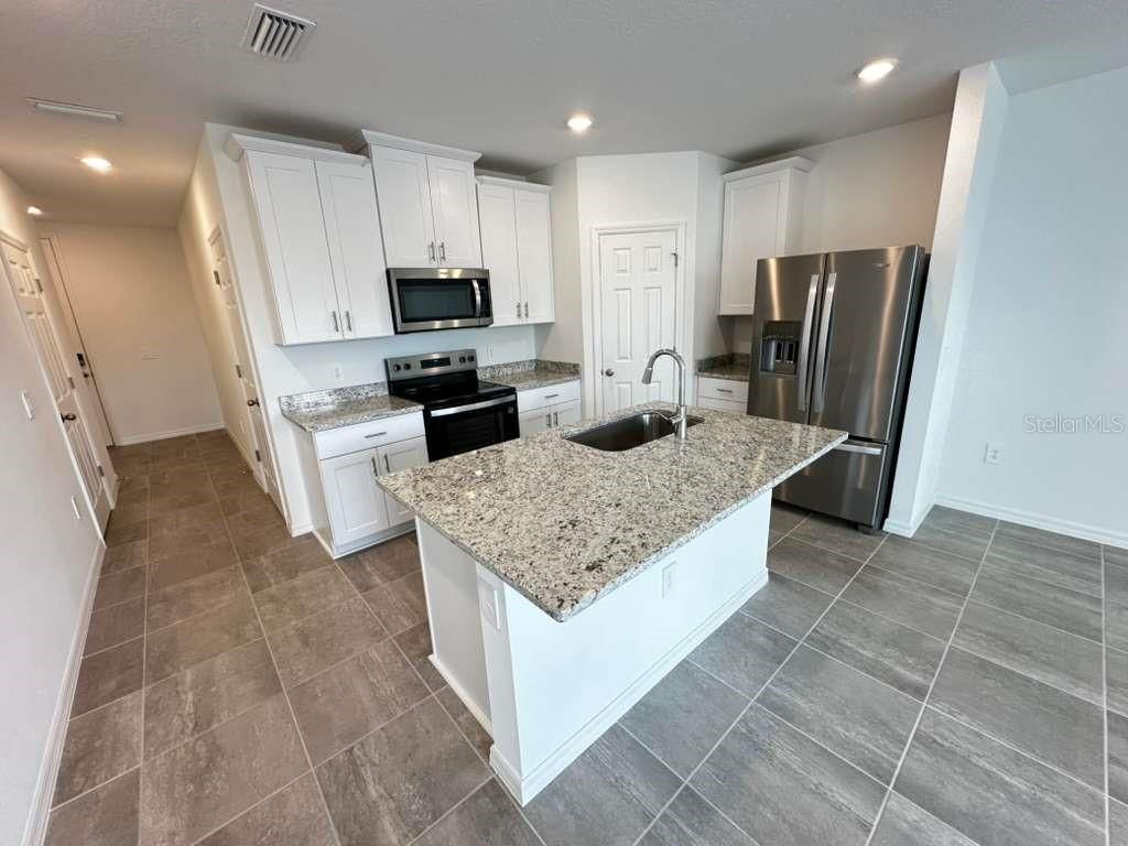 Photo of 16345 Bird Of Paradise Avenue, Clermont, FL 34714 (MLS # O6368868)