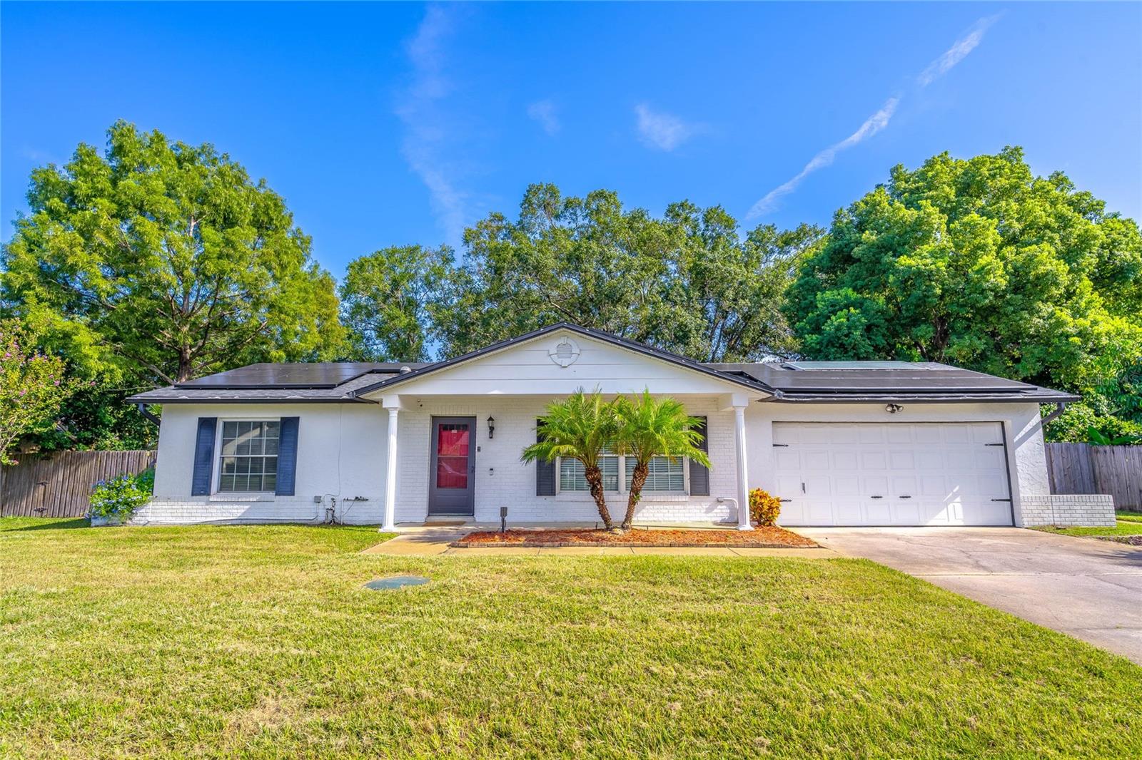 WELCOME HOME!! 8645 Pinestraw Lane offers a spacious 3bed 2bath 2 car garage home on a large lot with no HOA in the heart of Orlando. Once inside you will be greeted with an open floorplan consisting of a beautiful Living Room, Family Room, spacious kitchen and dining area. The split floorplan has the master suite on one side and the other 2 spacious bedrooms on the opposite end of the home. This home has a large screened in back patio with a large backyard oasis consisting of mature oak trees and completely fenced for privacy. There is a workshop out back equipped with A/C and insulated walls to keep you cool. There are many recent updates to include newer roof (2years old), A/C (2 years old), hot water heater (1 year old), whole house water filtration system (3 years old) and solar panels (2 years old,will be paid off at closing), dishwasher (1 year old), induction stove (3 years old). This home is an energy saver with low electric bills. Just minutes from the 417 and 408, conveniently located close to major attractions. YOU DON'T WANT TO MISS THIS GEM! Schedule a tour today