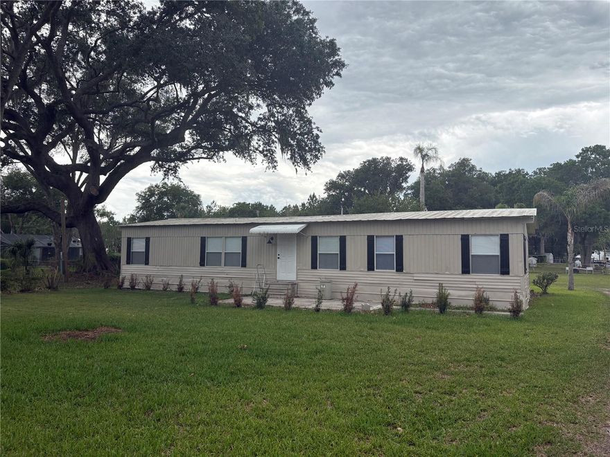 Easy Living in North Lakeland – Updated 3BR/2BA on ½ Acre!  Enjoy peaceful country-style living with modern updates in this newly refreshed 3 bedroom, 2 bathroom mobile home located in desirable North Lakeland. Situated on approximately half an acre, this home offers space, privacy, and convenience.  Features include:  • Brand-new wood laminate flooring throughout • Beautiful new soft-close cabinetry • Granite counter tops throughout • Fresh interior paint • New blinds • Updated kitchen with brand-new appliances.  Best of all, all utilities and lawn care are included in the monthly rent, making budgeting simple and stress-free.  Don’t miss this move-in-ready home with room to relax and enjoy! Contact us today for more information or to schedule your showing.