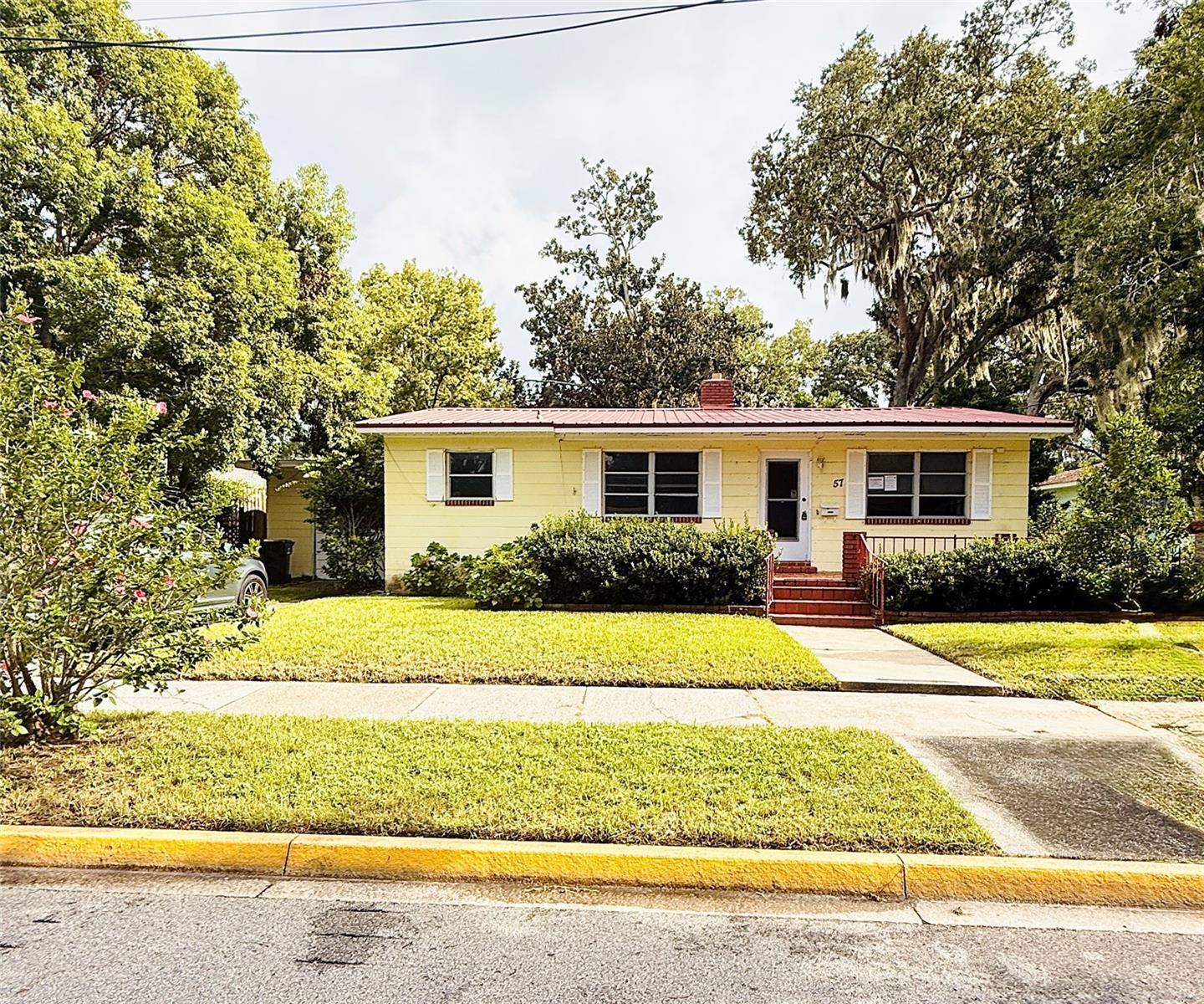 Welcome to 57 Fuller Drive, a charming residence in the heart of historic downtown St. Augustine. This 2-bedroom, 2-bath home offers the perfect blend of character, comfort, and location. Step inside to a bright and inviting living space with an open flow ideal for both relaxing and entertaining. Both bedrooms are generously sized, with the primary suite featuring its own en-suite bath. The attached garage provides secure parking and additional storage—an uncommon luxury in this desirable downtown area. Outdoors, the property truly shines with its large private yard, offering endless opportunities for gardening, outdoor dining, or simply enjoying the Florida sunshineCall Today! This listing will not last long!