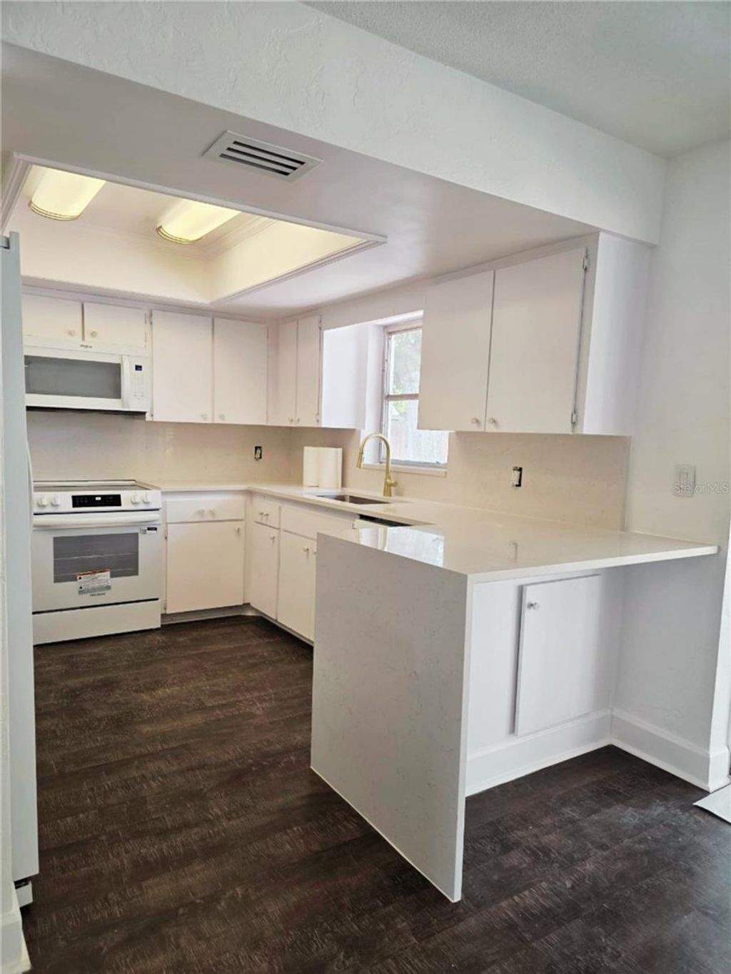 Photo of 5210 Dr Martin Luther King Jr St N Street, St Petersburg, FL 33703 (MLS # S5148335)