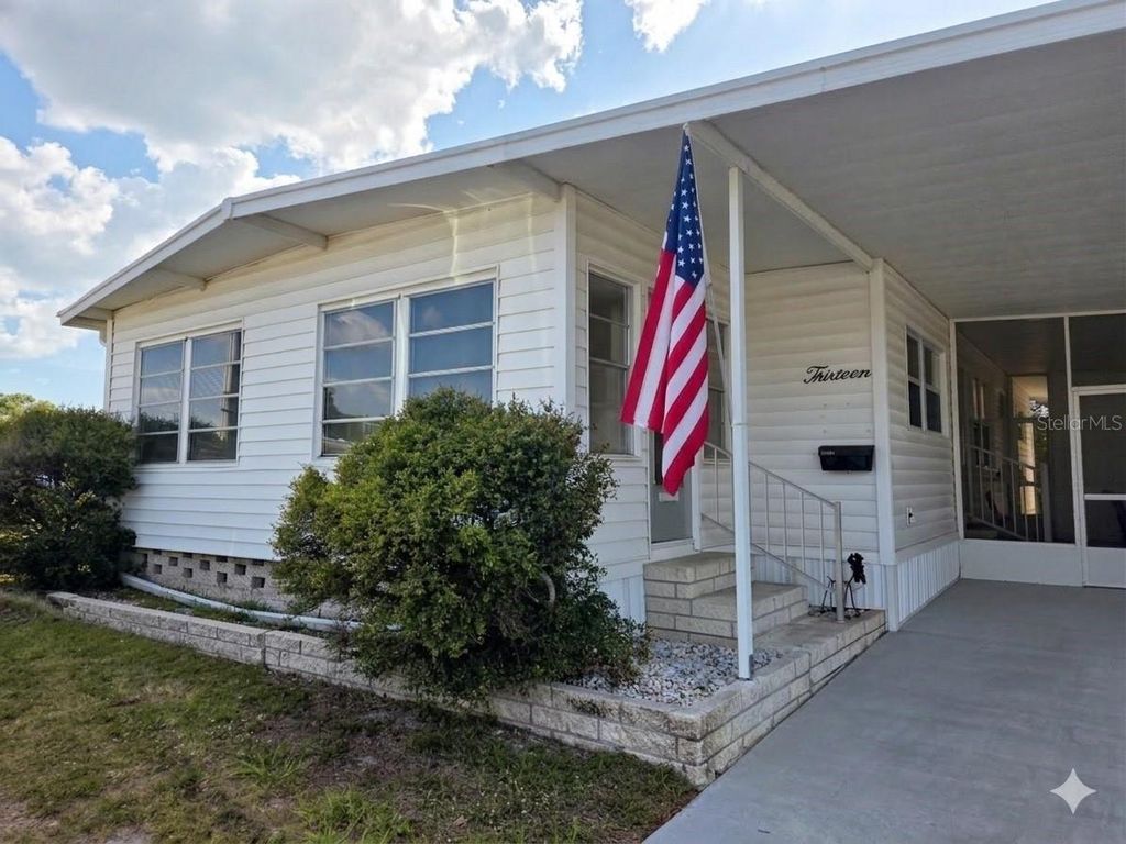 Photo of 9900 Ulmerton Road #13, Largo, FL 33771 (MLS # TB8492927)