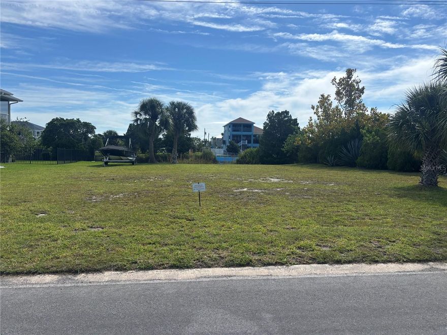 WATERFRONT LOT | CLEARED & READY TO BUILD | INDIRECT GULF ACCESS Build your dream coastal home on this .17-acre cleared lot in the heart of Hernando Beach! Situated on a brackish water canal, this prime parcel offers the perfect blend of tranquility and adventure with indirect access to the Gulf via the neighborhood canal system. Enjoy boating, kayaking, and fishing right from your backyard in a serene setting surrounded by Florida's natural beauty. Located on Gardenia Drive, this lot provides west-facing exposure for stunning sunset views and is just minutes from local marinas, boat ramps, and waterfront dining. With no HOA and the lot already cleared, you're one step closer to building your ideal stilt home, weekend getaway, or full-time residence. Utilities are nearby, and the canal leads to a community boat lift giving you access to open Gulf waters—ideal for the outdoor enthusiast. The home next door is also for purchase allowing you double the land without waiting to build mls #2251806 Hernando Beach is a hidden coastal gem, offering a laid-back lifestyle, access to the Weeki Wachee River, nature parks, and some of the best inshore fishing on Florida's Nature Coast. All this, with convenient access to Spring Hill and just over an hour to Tampa.