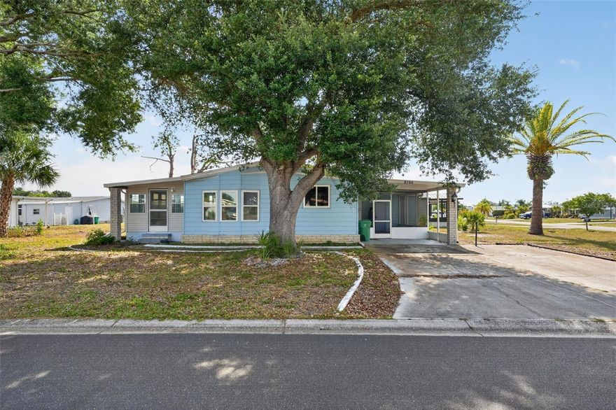 Welcome Home! 2-bedroom, 2-bath home located in Lemon Bay Isles Phase 2, a 55+ community in Englewood. This home sits on a corner lot and features a practical layout with updated flooring, kitchen cabinetry, bathroom vanities, toilets, mirrors, and double-pane windows. Conveniently located near shopping, dining, golf, boating, Manasota Key, and Englewood Beach. A great option for a full-time residence, seasonal home, or Florida getaway.