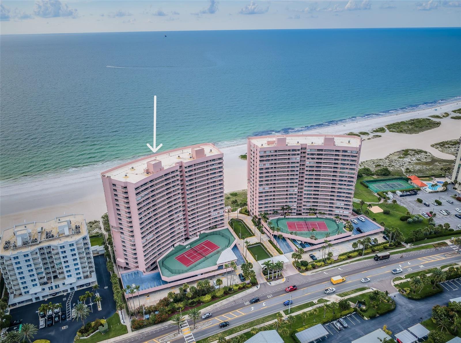 Direct Gulf front Crescent Beach Club condo – Discover this upscale residence on the sugary sands of Sand Key on Clearwater Beach! Experience Luxurious Coastal living and elegance with this one-bedroom, two-bath condo offering an unobstructed beachfront view of the private beaches of Sand Key and the azure waters of the Gulf of Mexico. Indulge in coastal elegance from the moment you step onto your sprawling beachfront balcony—where breathtaking, unobstructed views of the ocean stretch endlessly before you. Nestled on the shores of Sand Key, this charming condo offers unbeatable views and a rare opportunity to craft a lifetime of memories. With much of its original charm preserved, it’s the perfect sanctuary by the sea to create your dream coastal getaway. Whether you're looking for a weekend escape or a full-time slice of paradise, this gem invites you to unwind, refresh, and make it your own. Imagine waking up every morning to a sweeping view of the beach, feeling the cool breeze in your hair, and soaking up the sun's warmth. This sophisticated and exquisite condo is designed for comfort and elegance! Elevate your living experience with a wide-open living and dining room combination bathed in natural sunlight, featuring breathtaking ocean views. The open and airy design maximizes the natural light and showcases the stunning seascape, making it the perfect setting for both relaxation and entertaining. The well-maintained & efficient kitchen features ample storage & counter space, solid wood shaker cabinets, Corian countertops, tiled backsplash, added buffet area and a breakfast bar creating a natural connection between the kitchen and living room—perfect for casual dining, morning coffee, or keeping the conversation flowing while entertaining. Tucked just off the kitchen, there is a darling built-in dining nook with a bay window - equal parts charm and convenience. With its cozy bench seating and sunny disposition, it’s the perfect spot for morning coffee, casual meals, or catching up with friends over a bottle of wine. The Gulf front Primary Suite offers a serene retreat with a sliding glass door to the beachfront balcony along with a primary bath that pairs clean lines with vintage appeal, offering a well-maintained space that’s both functional and full of character and lastly, a huge walk-in closet with built-in shelving and added linen closet. The additional full bath off the entry provides added convenience for guests and ensures privacy. The ultimate everyday luxury, an In-unit laundry, adds a seamless blend of comfort and functionality to the convenience of this condo. Crescent Beach Club provides the amenities for a resort-style lifestyle. Other features include Gated community offering 24/7 security, heated saltwater pools & spa (one for each building), tennis, fitness center, billiard room, game room, grilling area, club room and on-site management. Enjoy private Beach Access where the azure waters of the Gulf meet pristine, white sands of the Beach! Easy access to public transportation and airports. Coveted Two-week minimum rental period – perfect for the Investor, second home buyer or primary residence. This exclusive oasis offers unparalleled tranquility and seclusion, perfect for those seeking a serene retreat. Bask in the beauty of stunning sunsets and enjoy the gentle sound of waves lapping at the shore. Start building cherished experiences and write your story by the sea!