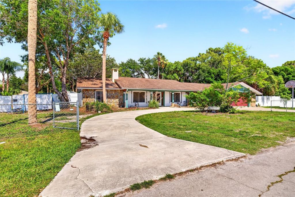 Photo of 16206 Sea Pines Drive, Hudson, FL 34667 (MLS # OM725447)