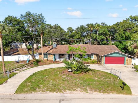 Photo of 16206 Sea Pines Drive, Hudson, FL 34667 (MLS # OM725447)