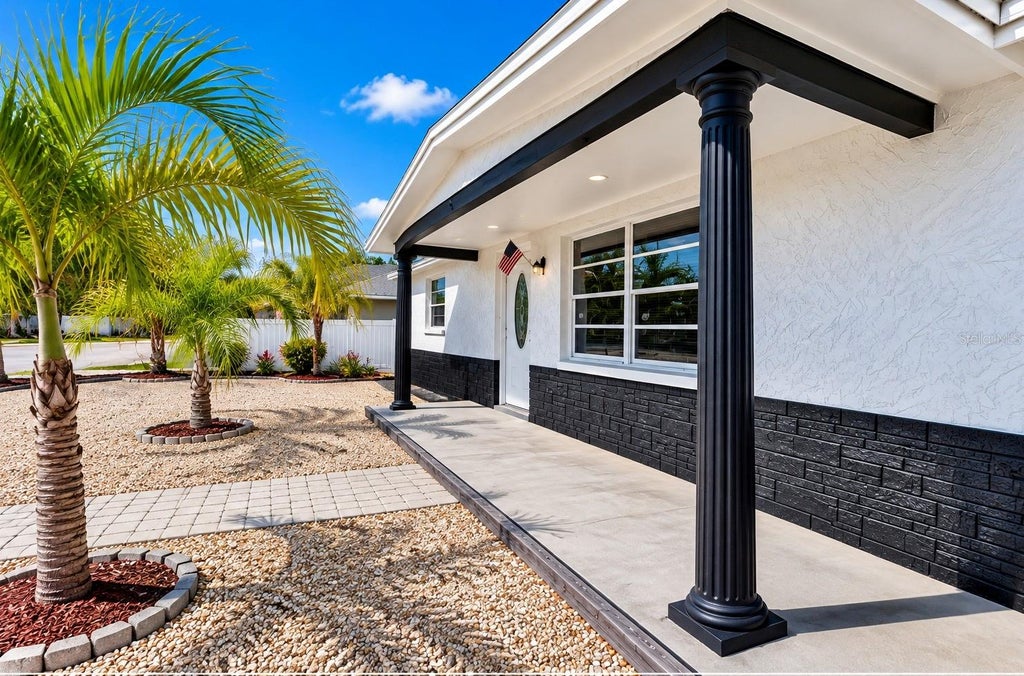 Photo of 7635 Sue Ellen Drive, Port Richey, FL 34668 (MLS # TB8559388)