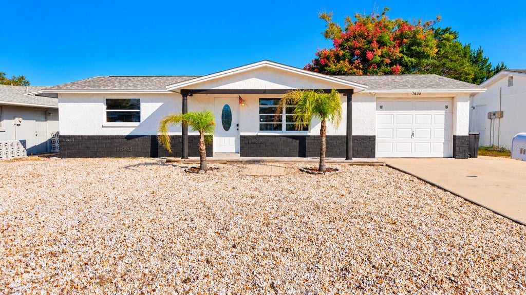 Photo of 7635 Sue Ellen Drive, Port Richey, FL 34668 (MLS # TB8559388)