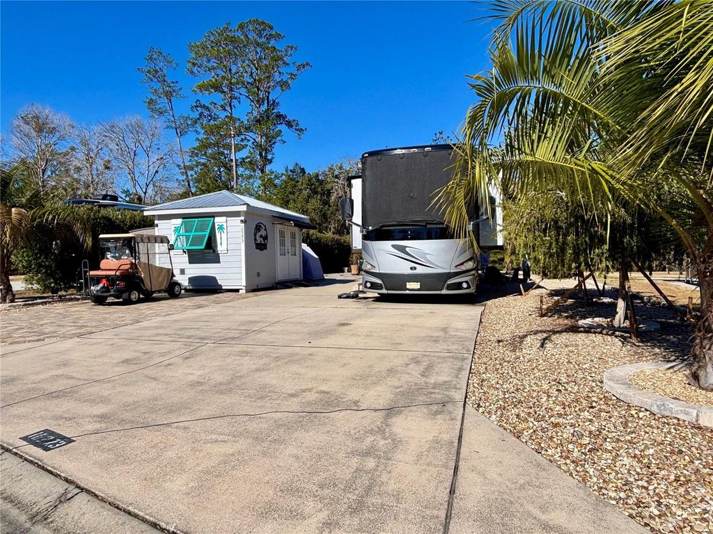 Photo of 10273 NE 28th Loop, Silver Springs, FL 34488 (MLS # OM718484)