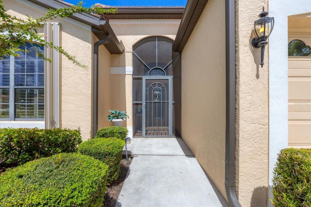 Photo of 4260 Mackay Falls Terrace, Sarasota, FL 34243 (MLS # A4667763)