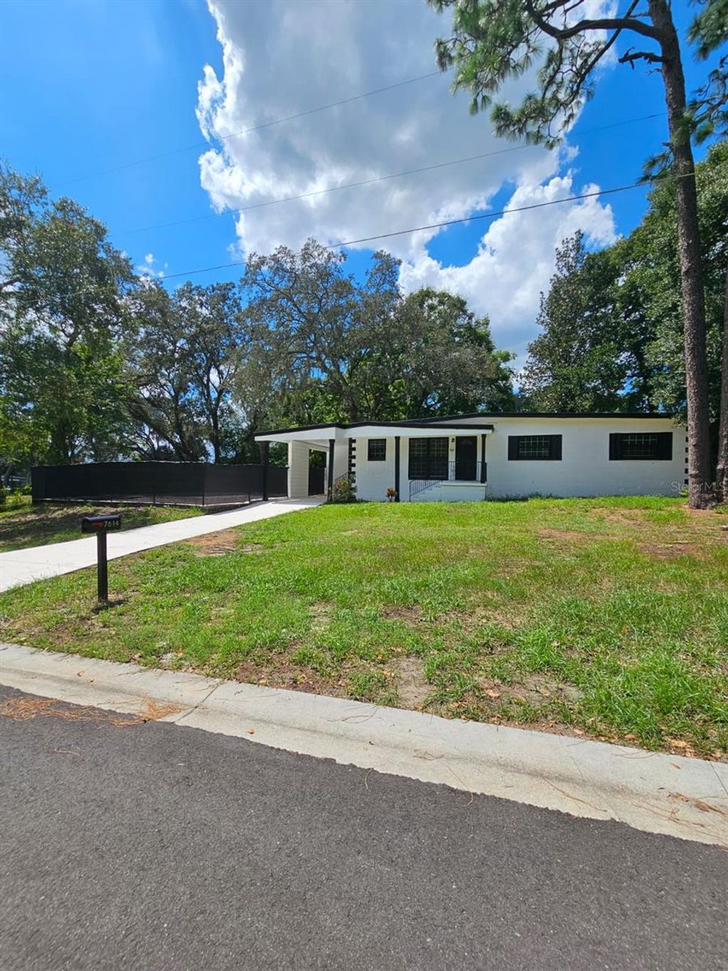 Photo of 7614 Bell Boulevard, Orlando, FL 32810 (MLS # O6378773)