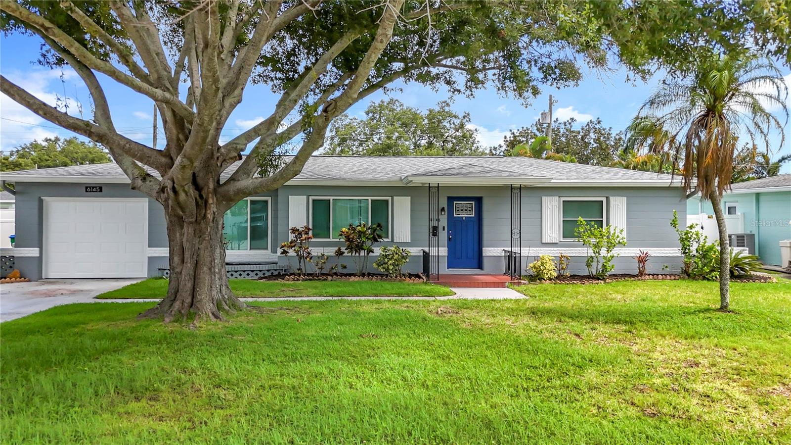 Discover your dream home at 6145 50th Ave N, Kenneth City, FL 33709—a completely updated, single-story 2-bedroom pool home that blends modern elegance with comfort. This stunning residence boasts a spacious living room, separate dining and family rooms, and an updated kitchen featuring rich dark wood cabinets, sleek stone countertops, and gleaming stainless steel appliances. The refreshed bathroom adds a touch of luxury, while the exterior shines with a custom-built pool (2021) complete with a sun deck, in-pool seating, and a table, all surrounded by a stylish paver patio. Relax on the covered, screened patio overlooking the pool and private, vinyl-fenced backyard. With a new 2025 roof, water heater, fresh exterior paint, and a 2015 AC, this home offers peace of mind and move-in-ready convenience. Nestled in the heart of Kenneth City, you’re just minutes from vibrant local attractions. Enjoy the sugar-white sands of Madeira Beach (7 miles) or the lively boardwalk at John’s Pass Village (8 miles). Explore cultural gems like the Salvador Dali Museum (9 miles) in downtown St. Petersburg or catch a game at Tropicana Field (10 miles). For family fun, visit the Clearwater Marine Aquarium (15 miles) or take a scenic drive to Fort De Soto Park (18 miles) for kayaking and nature trails. With shopping, dining, and entertainment all within a 20-mile radius, this home is perfectly positioned for the ultimate Florida lifestyle.