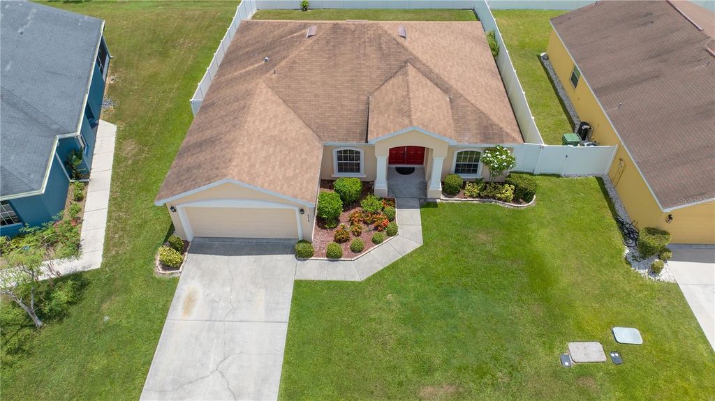 Photo of 6518 Crescent Loop, Winter Haven, FL 33884 (MLS # O6384613)