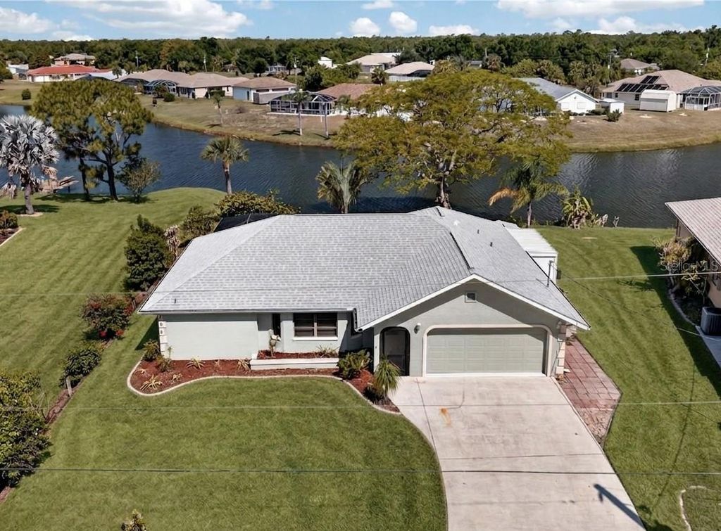 Photo of 289 Macarthur Drive, Port Charlotte, FL 33954 (MLS # C7525250)