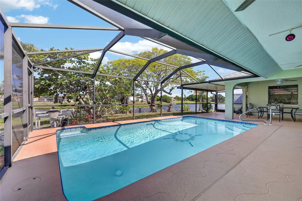 Photo of 289 Macarthur Drive, Port Charlotte, FL 33954 (MLS # C7525250)