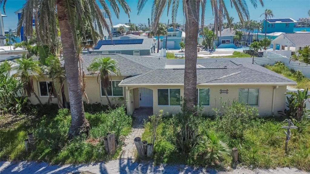 Photo of 363 145th Avenue E, Madeira Beach, FL 33708 (MLS # TB8428034)