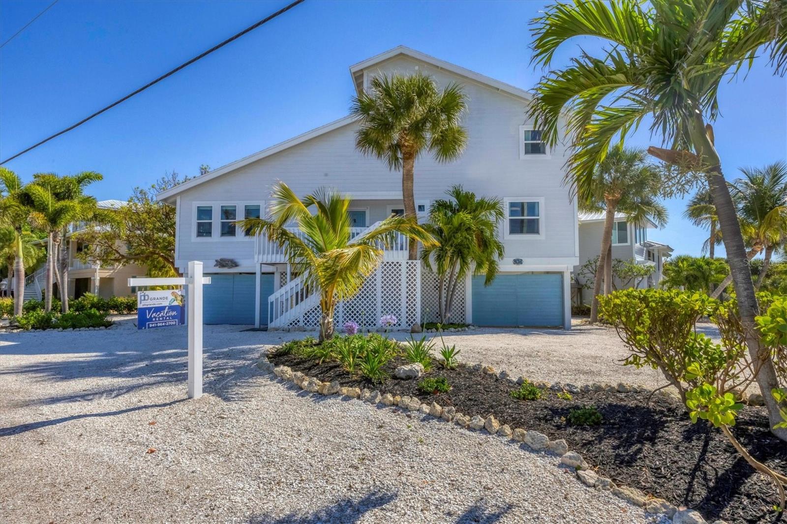 Weekly rate shown, please see description for detailed pricing.
Discover the ultimate coastal retreat at this beautifully updated 3-bedroom, 2-bath home, ideally located just steps from the island's pristine beaches. Surrounded by lush tropical landscaping, this residence offers the perfect blend of modern comfort, elegance, and classic island charm.
Inside, the home is filled with natural light and coastal-inspired finishes. The open living area is designed for both relaxation and entertaining, featuring modern furnishings, soft textures, and tasteful accents that evoke a serene, beachside ambiance. The fully equipped kitchen boasts stainless steel appliances, ample counter space, and everything needed to prepare meals for family and friends. Dine at the elegant table for six, or enjoy your meals on the screened-in porch while surrounded by swaying palms and gentle island breezes.
Retreat to one of three thoughtfully appointed bedrooms for a restful night. The oversized primary suite features a king-sized bed and private en-suite bathroom, creating a luxurious sanctuary. A second bedroom offers a cozy queen bed, while the third is outfitted with a large bunk bed with a full-size lower bed and twin upper bed, perfect for extra guests. Each bedroom is designed with comfort and tranquility in mind, offering plush bedding and soothing d cor.
Enjoy the best of island living from the porch or visit the beach to soak up the sun and experience Boca Grande s world-famous sunsets. The home s prime location, just south of the Historic District, makes it easy to explore charming shops, art galleries, and fine dining establishments. Outdoor enthusiasts will delight in nearby opportunities for fishing, kayaking, paddleboarding, and exploring the island s scenic trails.
Whether you re seeking relaxation, adventure, or quality time with loved ones, this updated home provides a luxurious base for your Boca Grande escape. Book now to experience the perfect blend of coastal elegance, comfort, and island charm. Off-season: $4315 weekly/$18500 monthly Mid-season: $5230 weekly/$22400 monthly In-season: $5810 weekly/$24900 monthly