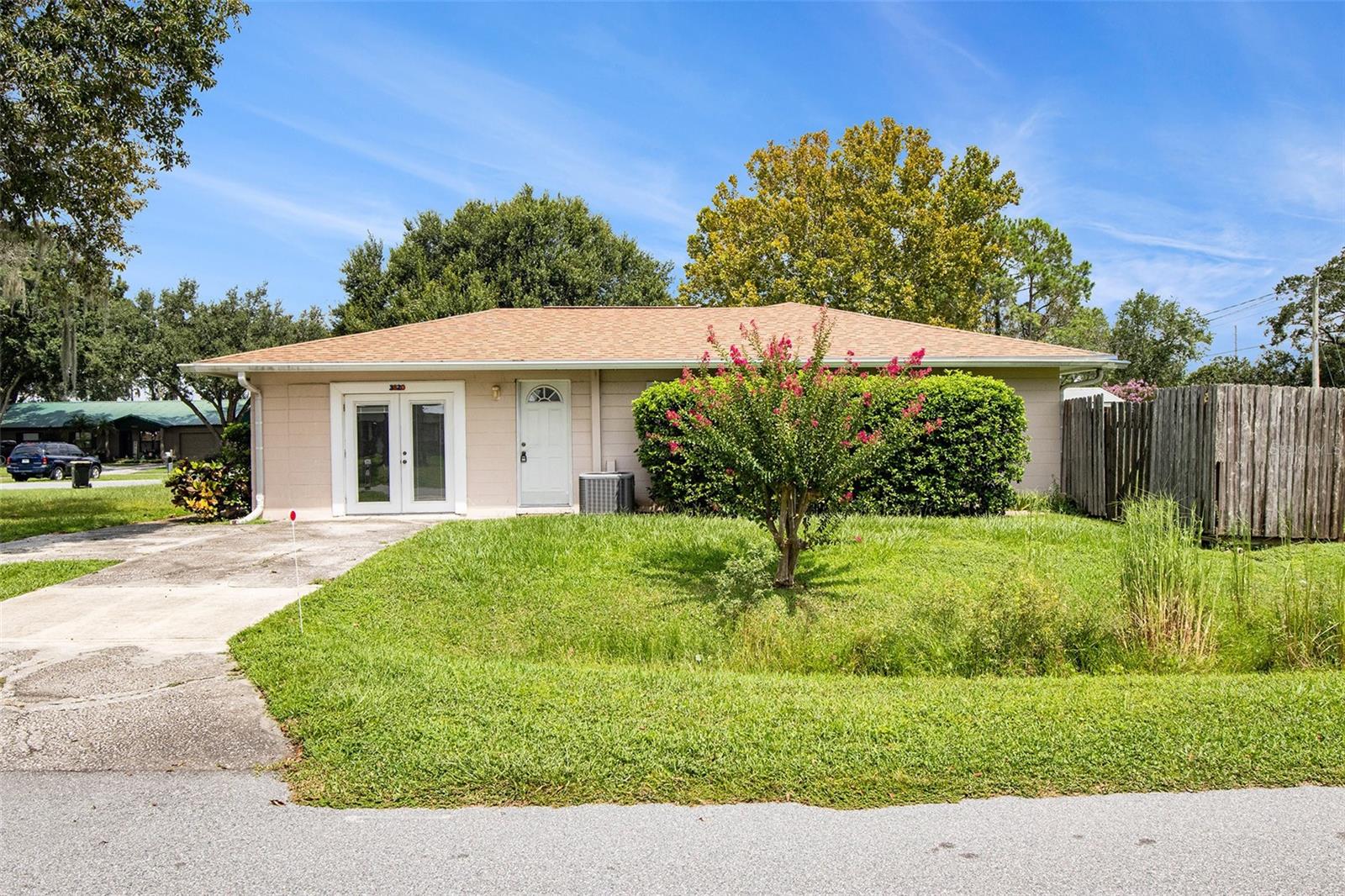 Welcome to your perfect family home in the heart of Lakeland! This charming 3-bedroom, 2-bathroom residence, built in 1977, sits proudly on an expansive 1/4-acre corner lot. The exterior exudes curb appeal, and the interior is equally impressive. The roof, HVAC system, and water heater have all been recently updated within the past 2 to 5 years, ensuring worry-free living. The entire home was repiped just 6 years ago, guaranteeing efficient plumbing for years to come. Inside, you'll be delighted by the modern touches, with LVP flooring throughout for a stylish and easy-to-maintain living space. The kitchen and bathrooms boast beautiful tile flooring, adding a touch of elegance. With its prime location, this home offers easy access to schools, shopping, and recreational activities. Don't miss out on this wonderful opportunity to make cherished memories in this lovely Lakeland abode!