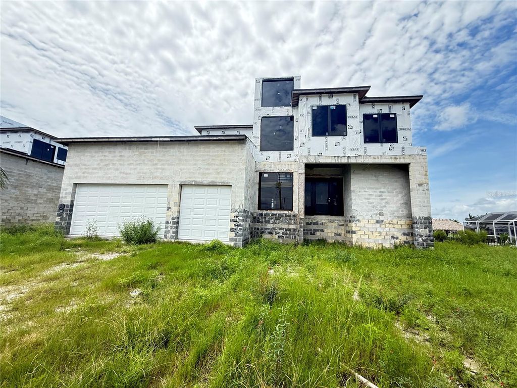 Photo of 234 Bangsberg Road SE, Port Charlotte, FL 33952 (MLS # C7509553)