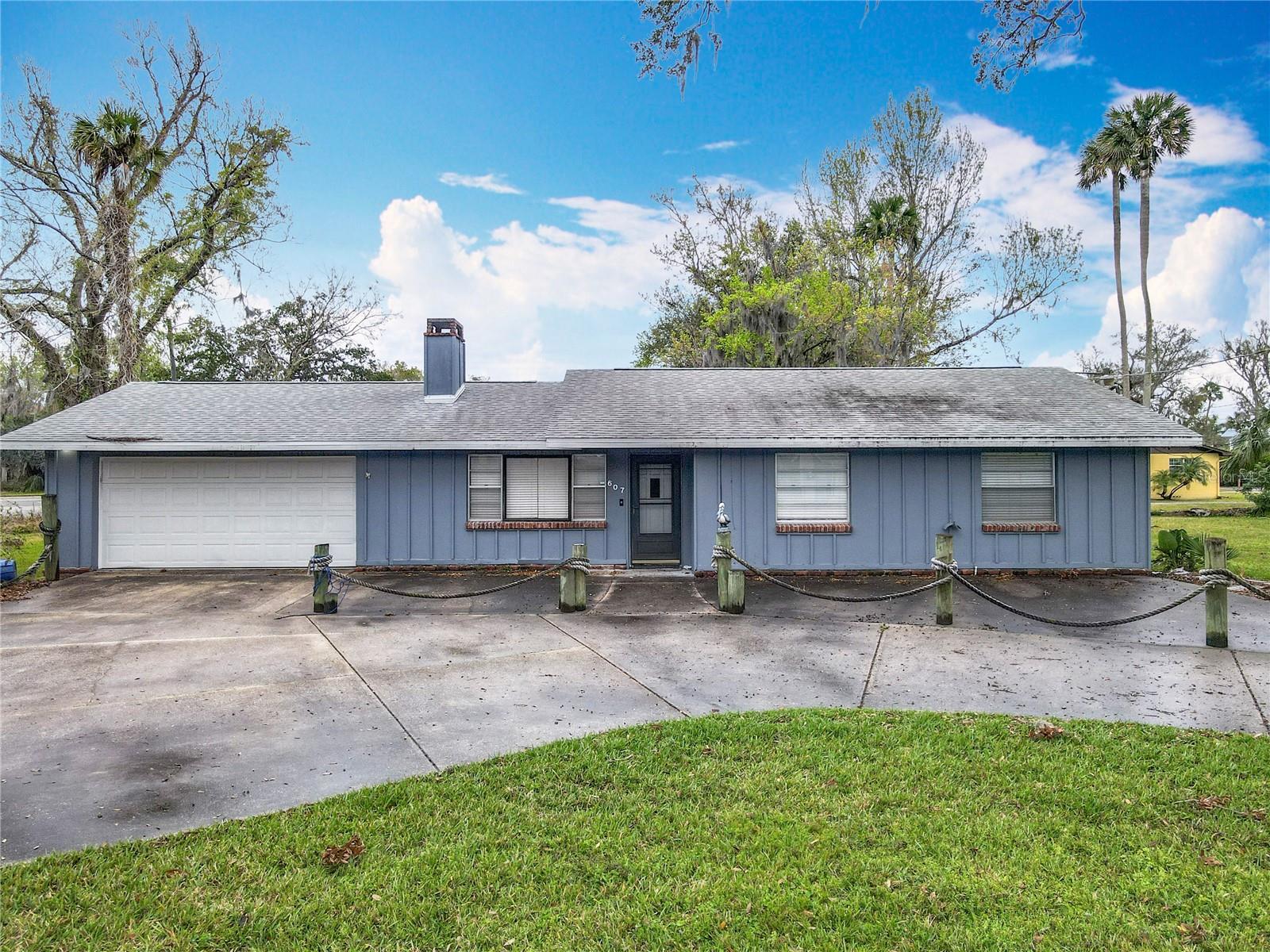 Investors, take note! This incredible income-generating property is a rare find, offering unmatched potential and immediate cash flow. Situated on a sprawling 0.73-acre double lot—the largest in the neighborhood—this unique property is already producing $3,100 per month in rental income. The one-bedroom Airbnb unit is bringing in $1,200 monthly, while the two-bedroom unit, previously rented long-term, generated $1,900 per month.
With the opportunity to build additional structures, such as a second home or a mother-in-law suite, this property is perfect for expanding your investment portfolio. The circular driveway provides easy access for tenants and guests, enhancing convenience and functionality.
Inside, this Florida beach-style home showcases its charm with warm wooden accents and modern updates throughout. Recent renovations include updated kitchen cabinets, sleek new flooring, fresh paint, and completely remodeled bathrooms. The property is already partitioned, making it ideal for multi-unit rentals or flexible living arrangements.
The prime location, just minutes from the beach and close to shopping, dining, and entertainment, makes this property even more attractive for short-term or long-term tenants. With its strong rental history and future potential, this is an investment you don’t want to miss. Seize this incredible opportunity today!