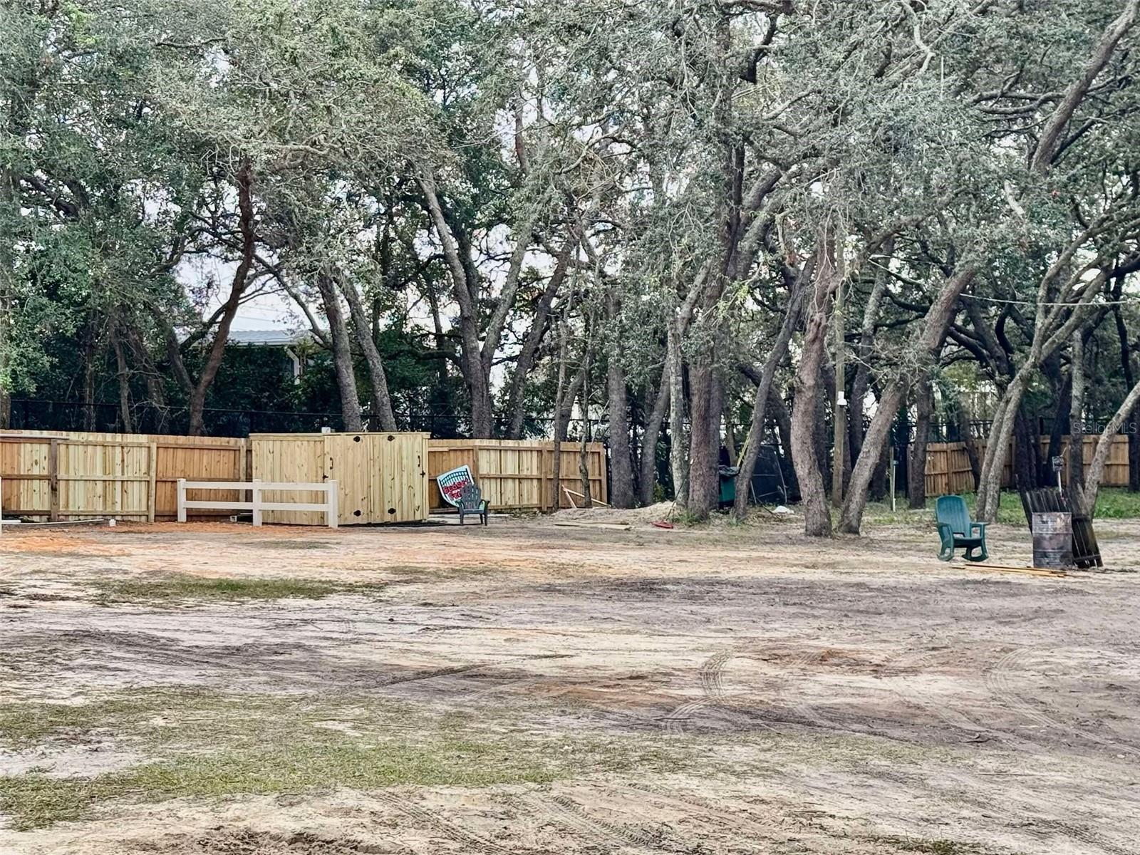 APOPKA-UNINCORPORATED ORANGE COUNTY .69 ACRE PARCEL. Property is located off Clarcona Road in close proximity to the 414 Maitland exchange and the 429-toll road. This property is good for setting up multiple pads for popup campers or tents for income producing land. There is a septic and water, as well as bathroom facilities for the campers. Located in Northwest Orlando area, approximately 2 miles from downtown Apopka, 35 minute from Disney area.