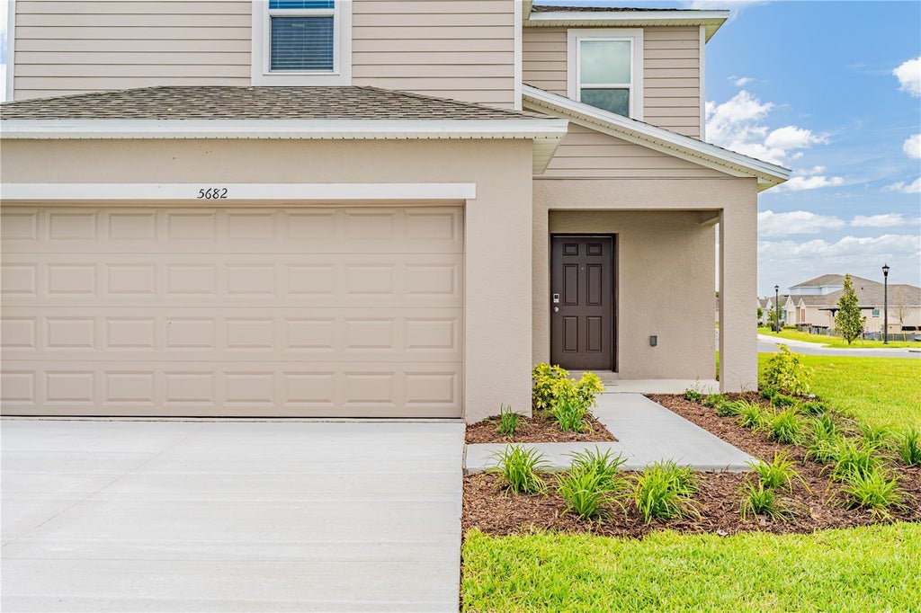 Photo of 5682 Nispero Way, Kissimmee, FL 34758 (MLS # O6438987)
