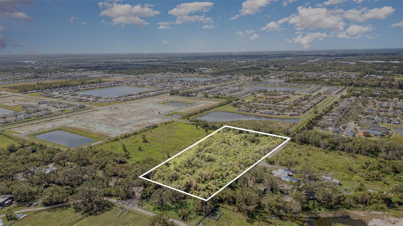 RUSKIN COLONY FARMS - Land