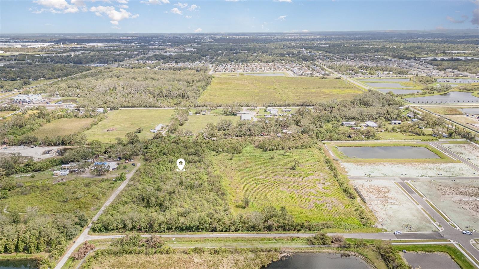 RUSKIN COLONY FARMS - Land