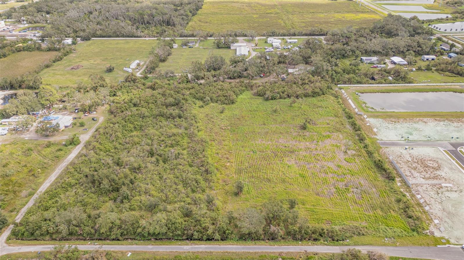 RUSKIN COLONY FARMS - Land