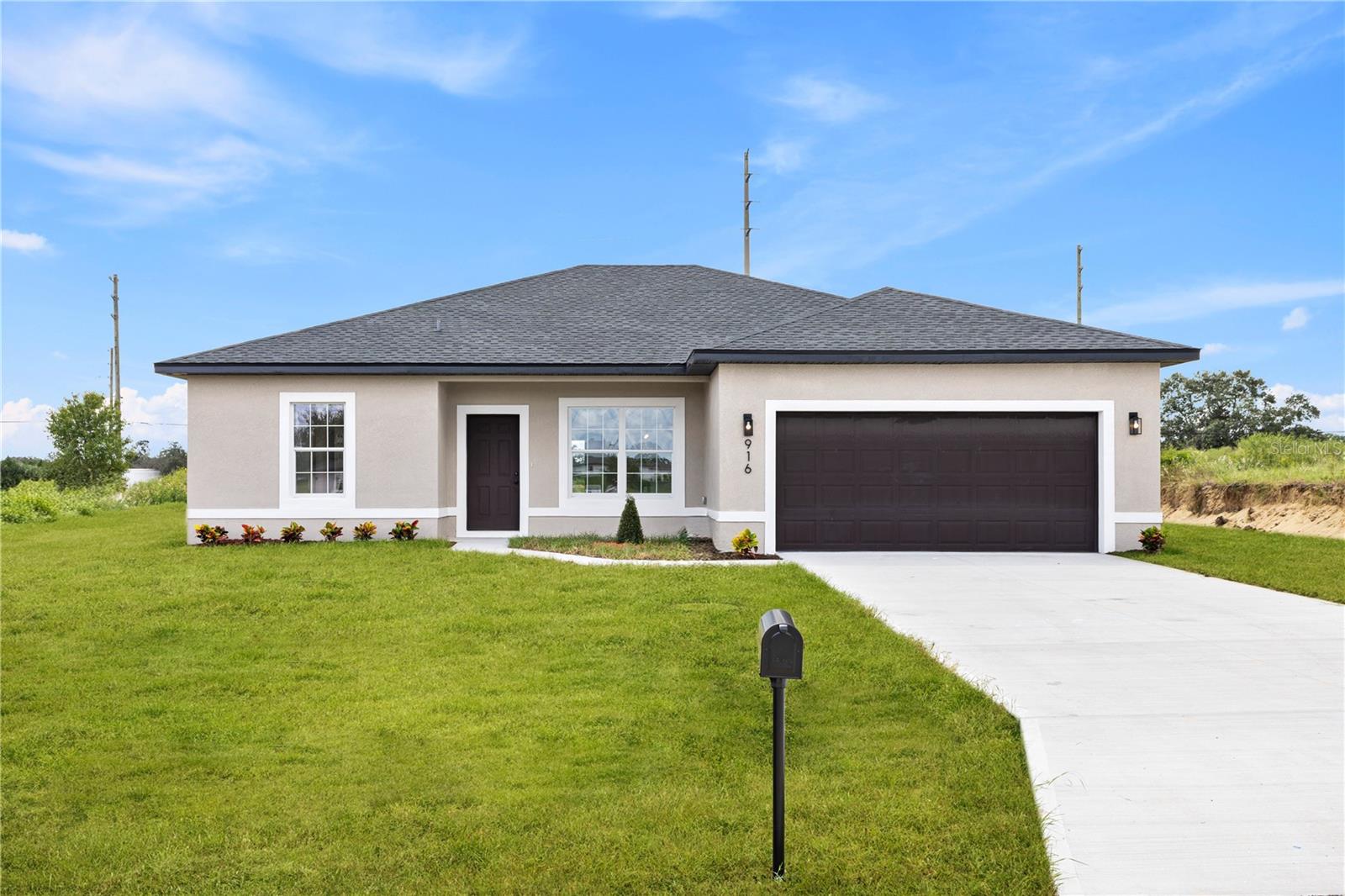 ***MOVE IN READY*** NEW CONSTRUCTION - OVERSIZED LOT - PRIME LOCATION – 4 BEDROOMS 2 AND 1 HALF BATHROOMS IN THE BEST LOCATION of Poinciana Villages Community. This 2,336 sq. ft. under roof house have a welcoming open concept floor plan with modern finishes offers 4 BEDROOMS 2 AND 1 HALF BATHROOMS, 2 car garage, full of INCLUDED UPGRADES such as: FULL appliances package, vaulted ceiling / solid wood soft close cabinets in the kitchen / solid wood vanity in the bathrooms / double sink in the master bathrooms / walk in master shower / Walk in master closet / Luxury vinyl plank flooring throughout the house / tiled bathroom floors / tiled floor to ceiling in the showers / high ceilings / luxury handles / 2 car garage / long driveway (might fit 4 cars) / extended covered lanai / the windows are energy efficient / home includes brand-new stainless-steel appliances. Association monthly fee includes Spectrum cable and internet. Poinciana is the new place to be! Close to your new home, you will find Publix, Walmart Supercenter, APV Fitness Center and Pools of Poinciana, Malls, HCA Hospital, etc. The Poinciana Parkway Extension/I-4 Connector Expressway and the SunRail station will ease your commute. Nearby enjoy Lake Marion and the many trails in the 12,000-acre Disney Wilderness Preserve, home to more than 1,000 species of plants and animals. Discover the community park with the dog park, picnic facilities, basketball courts and baseball facility. Exercise at the gym and aquatic center with the huge community pool. This property is great for investors, first-time buyers or families looking for a larger home with a larger backyard Close to Lake Marion Creek Middle School, Laurel Elementary School, Poinciana Community Park, Poinciana Medical Center. Enjoy the benefits that the community of Poinciana Villages has to offer.