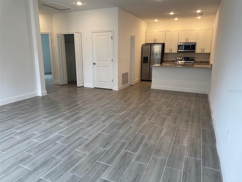Photo of 1604 Cumin Drive, Poinciana, FL 34759 (MLS # O6448453)