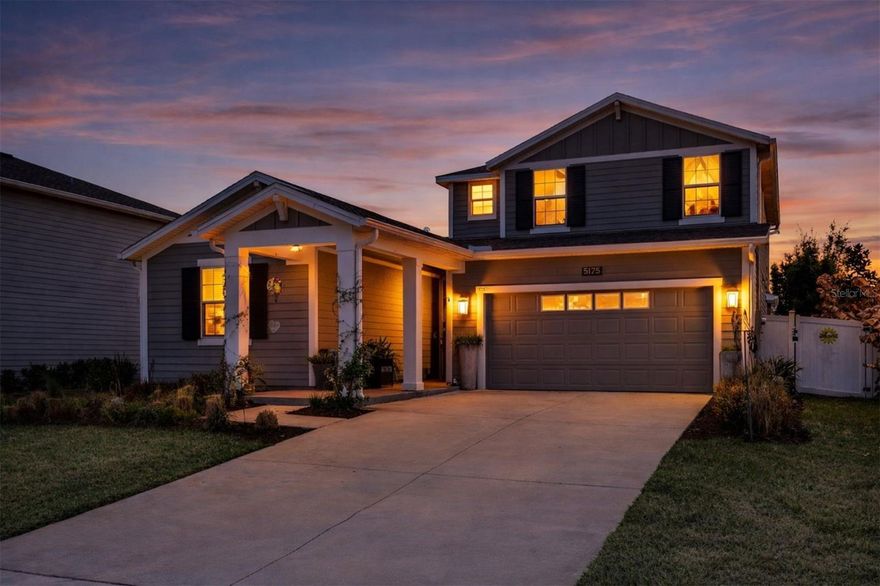 This MOVE-IN READY 5 BEDROOM, 4 BATH POOL HOME offers the highly desirable NEXT GEN floor plan, perfect for MULTI-GENERATIONAL LIVING or a private IN-LAW SUITE with its own PRIVATE EXTERIOR ENTRANCE, full kitchen, living room, bedroom, and full bathroom—ideal for extended family, guests, or flexible living arrangements. The PRIMARY SUITE is conveniently located on the FIRST FLOOR, along with an additional downstairs guest bedroom with its own full bath, making it perfect for a HOME OFFICE or private guest retreat. Upstairs you’ll find a spacious LOFT/BONUS ROOM plus two additional bedrooms and a full bathroom. The OPEN CONCEPT layout is enhanced by TILE FLOORING, QUARTZ COUNTERTOPS, 42-INCH CABINETS, CROWN MOLDING, and abundant natural light. Step outside to your private backyard oasis featuring a 24 x 11 POOL installed in 2022 with a beautiful WATERFALL FEATURE—perfect for enjoying Florida outdoor living year-round. Fully fenced for privacy, security, and peace of mind! The home is constructed with durable LP SmartSide siding, known for its IMPACT RESISTANCE, moisture protection, termite resistance, and LOW MAINTENANCE durability—ideal for Florida’s climate. The solar panels make this better than new home energy efficient. Stoneybrook Hills offers RESORT-STYLE AMENITIES including a community pool, splash pad, clubhouse, fitness center with child play area, basketball and tennis courts, greenspace, and 24-hour guard-gated security. Conveniently located near shopping, dining, and everyday essentials, and just 4 miles from historic downtown Mount Dora, known for its waterfront views, boutique shopping, dining, and year-round festivals. If you are searching for HOMES FOR SALE IN MOUNT DORA FL, a POOL HOME, or a NEXT GEN HOME WITH IN-LAW SUITE, this exceptional property checks every box.